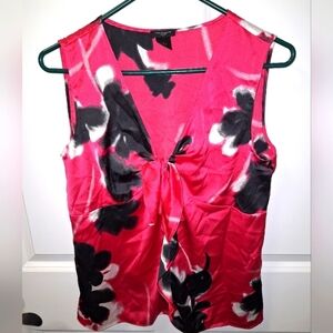 An Ann Taylor sleeveless tunic top in a ladies' small.